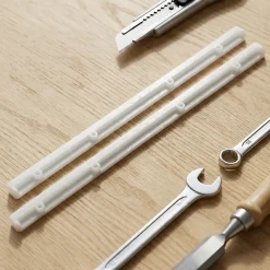 2 coulisses Plastique L. 268 mm x H. 15 mm x EP. 11mm