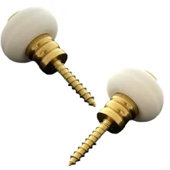Lot de 2 butoirs en laiton verni avec vis. Diamètre 30mm, hauteur 32mm. Corps ondulé vintage et bague blanche. MADE IN FRANCE