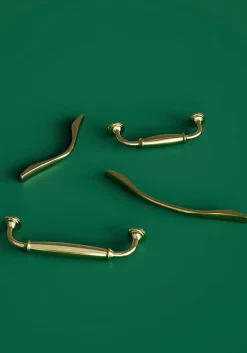 Poignée de meuble nœud GoodHome Ruis effet laiton doré l.169mm x l.10mm x H. 25mm entraxe 128mm